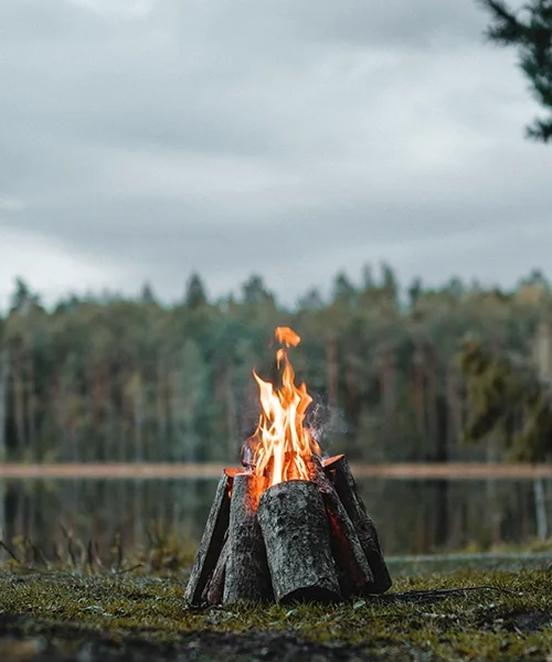 campfire at bluemist resort in athirappilly