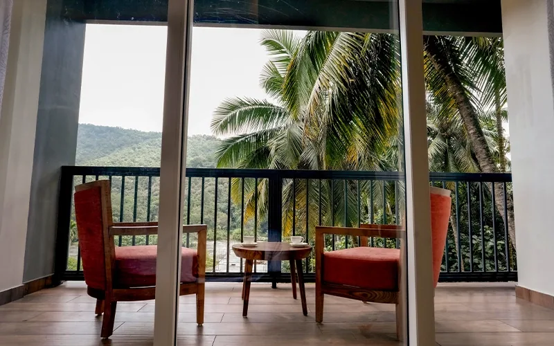 balcony view of top resort in athirappilly